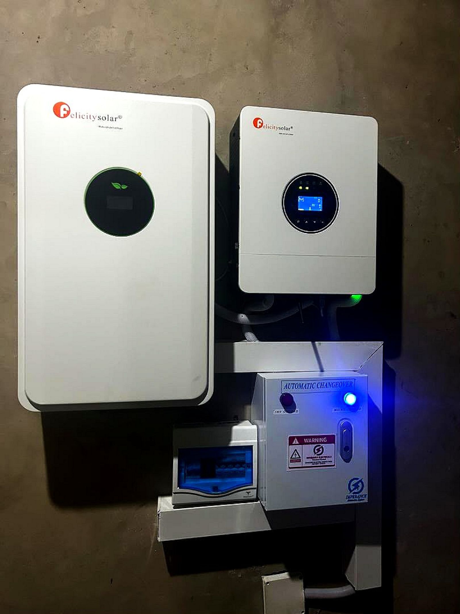 A Felicity Solar inverter and battery with an automatic changeover switch